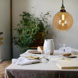 גוף תאורה תלויי תקרה דגם עוז ענבר כהה