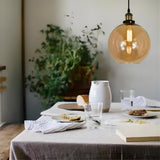 גוף תאורה תלויי תקרה דגם עוז ענבר כהה